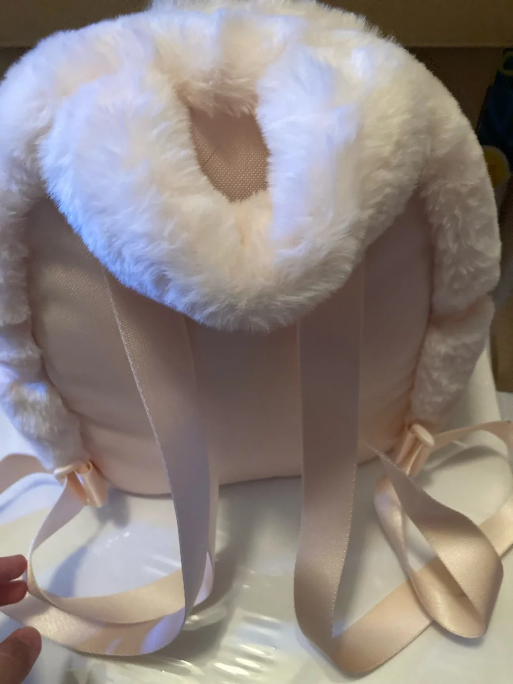 Nike Plush Faux Fur Backpack in Light Pink with Black Swoosh